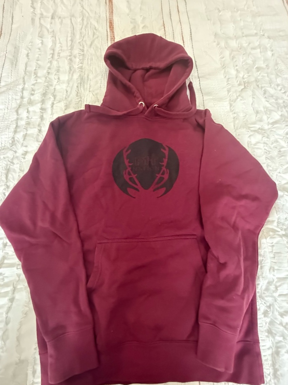 Maroon Hoodie with Black Graphic Emblem